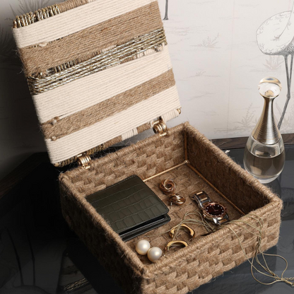 handwoven box, adorned with classic accents and crafted from upcycled plastic, jute, and cotton ropes on a sturdy iron frame.