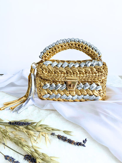 Handcrafted gold and silver crochet bag, a stylish statement for parties.