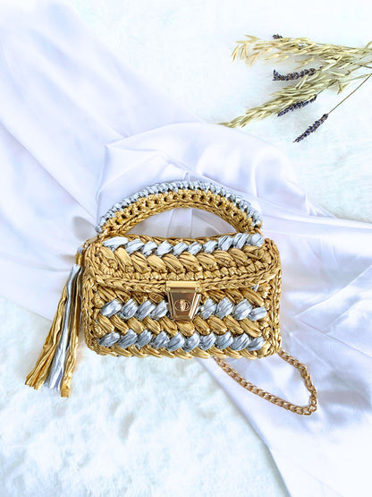 Elegant gold and silver duo crochet bag – the perfect party accessory.