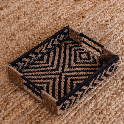 Enhance your tabletop with the rustic charm of this handwoven tray, created by women artisans in a diamond pattern using natural jute, cotton, or upcycled ropes