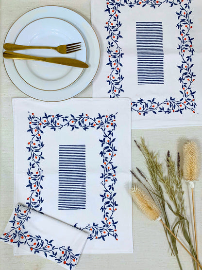 Enhance your dining decor with this set of 6 double-layered placemats, featuring a block-printed floral pattern on GOTS certified organic cotton for durability, style, and sustainability.