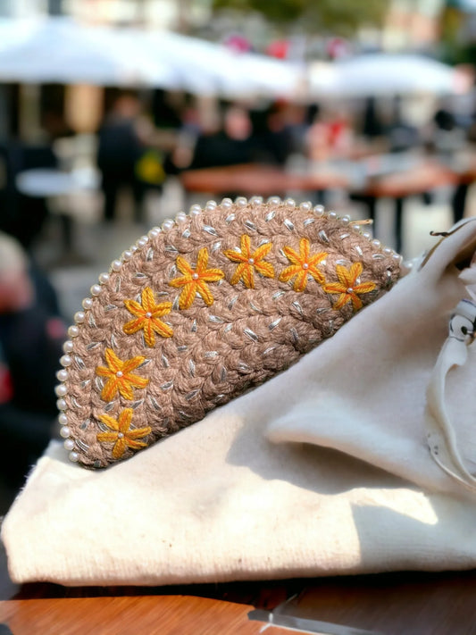 embroidered clutch bag with yellow flowers