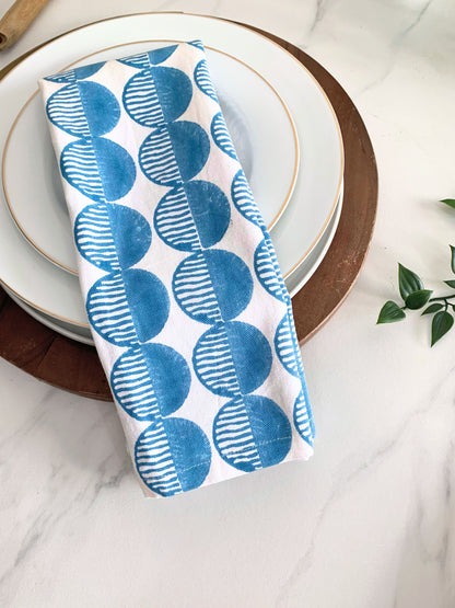 Elevate your kitchen decor with a set of 2 tea towels, featuring block-printed circles on organic cotton – a stylish and sustainable choice.