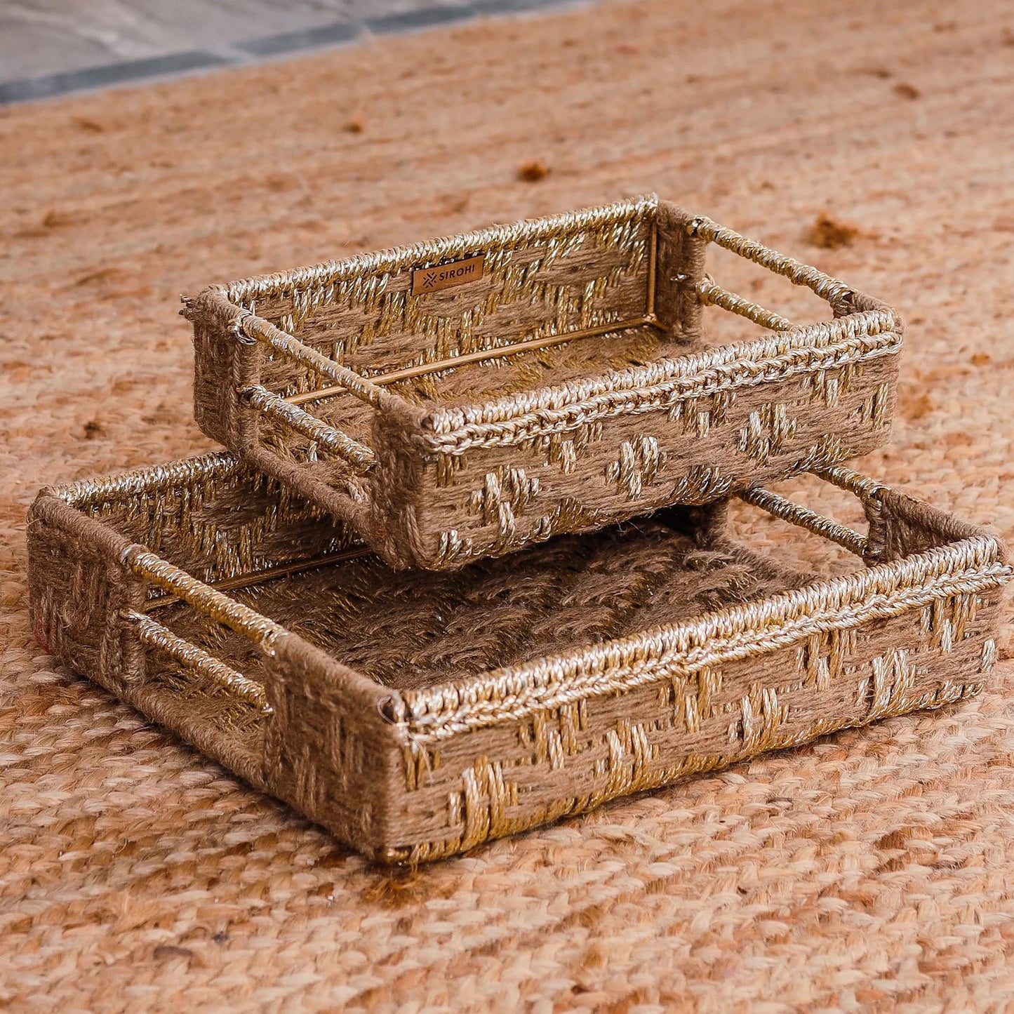 Woven trays made from jute and upcycled plastic. Luxury gifting solutions.