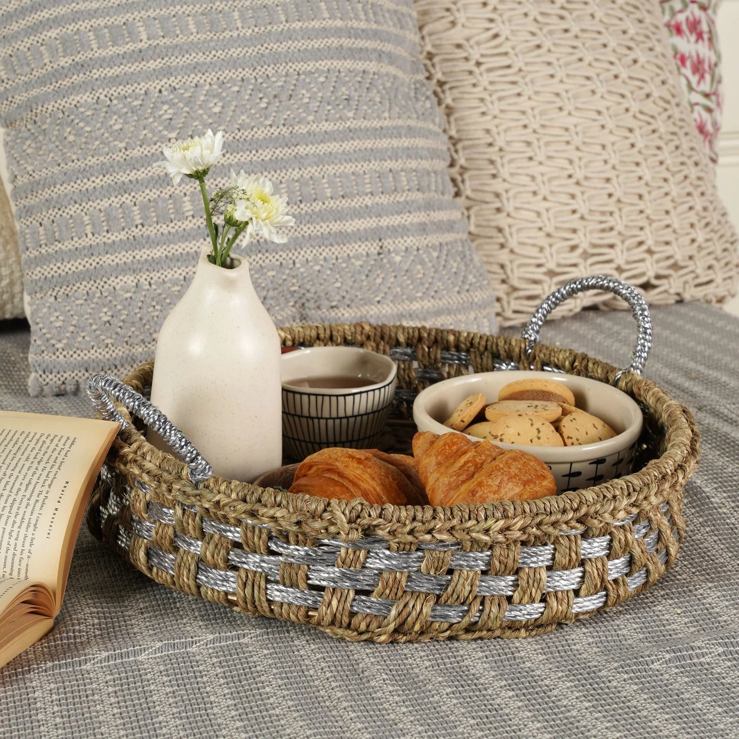 Add a touch of luxury to your breakfast experience with this handwoven tray crafted from natural grass and upcycled plastic.