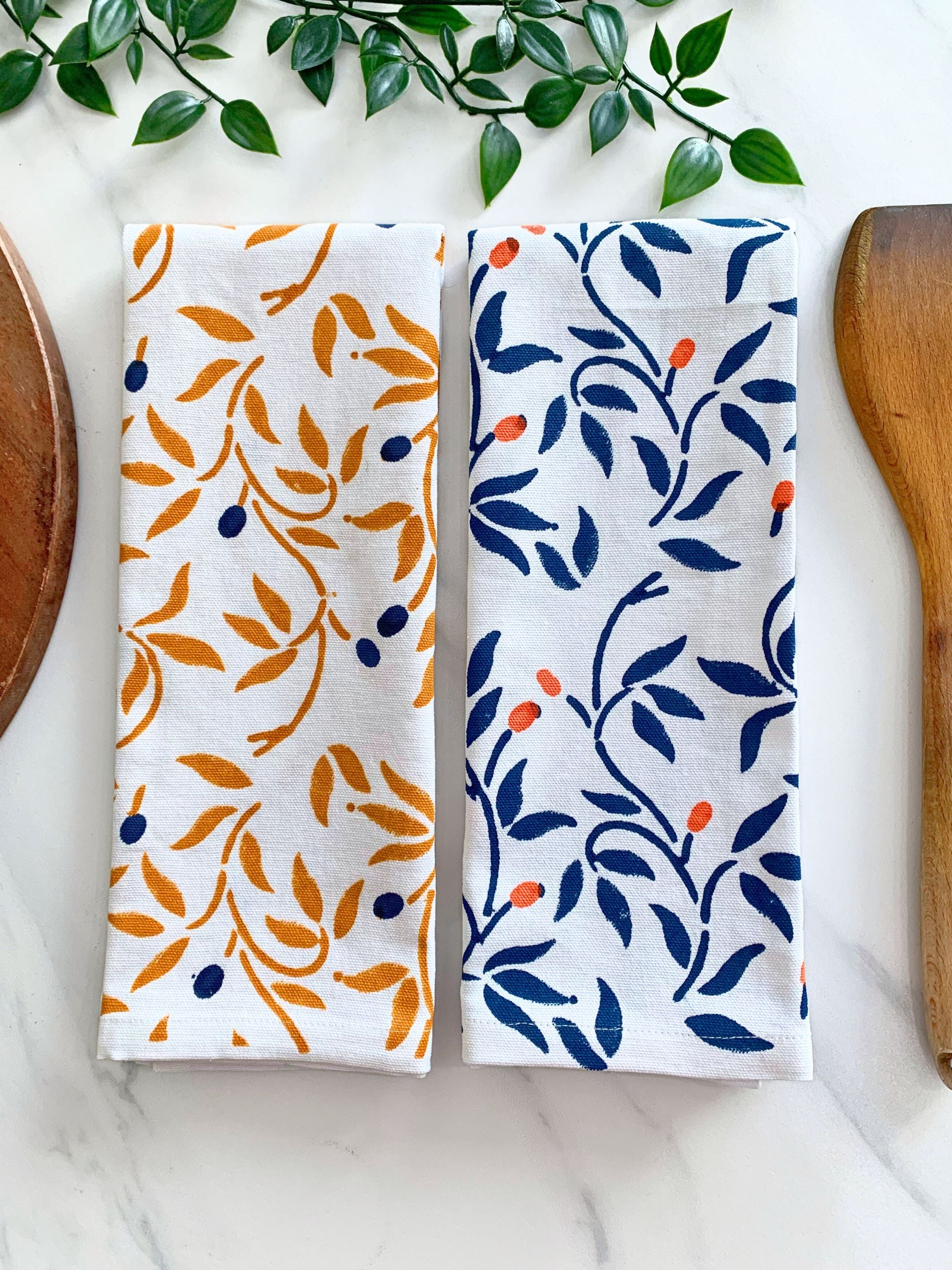 Eco-friendly tea towel set of 2 in blue and mustard with a floral design, offering a delightful variation for your kitchen.