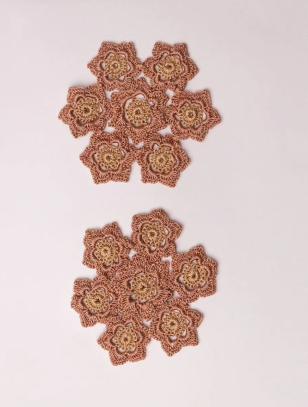 Charming rust beige crochet coaster, adding sophistication to your table.