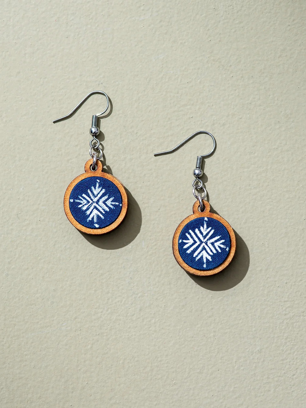 Contemporary tribal jewelry featuring hand-painted elements