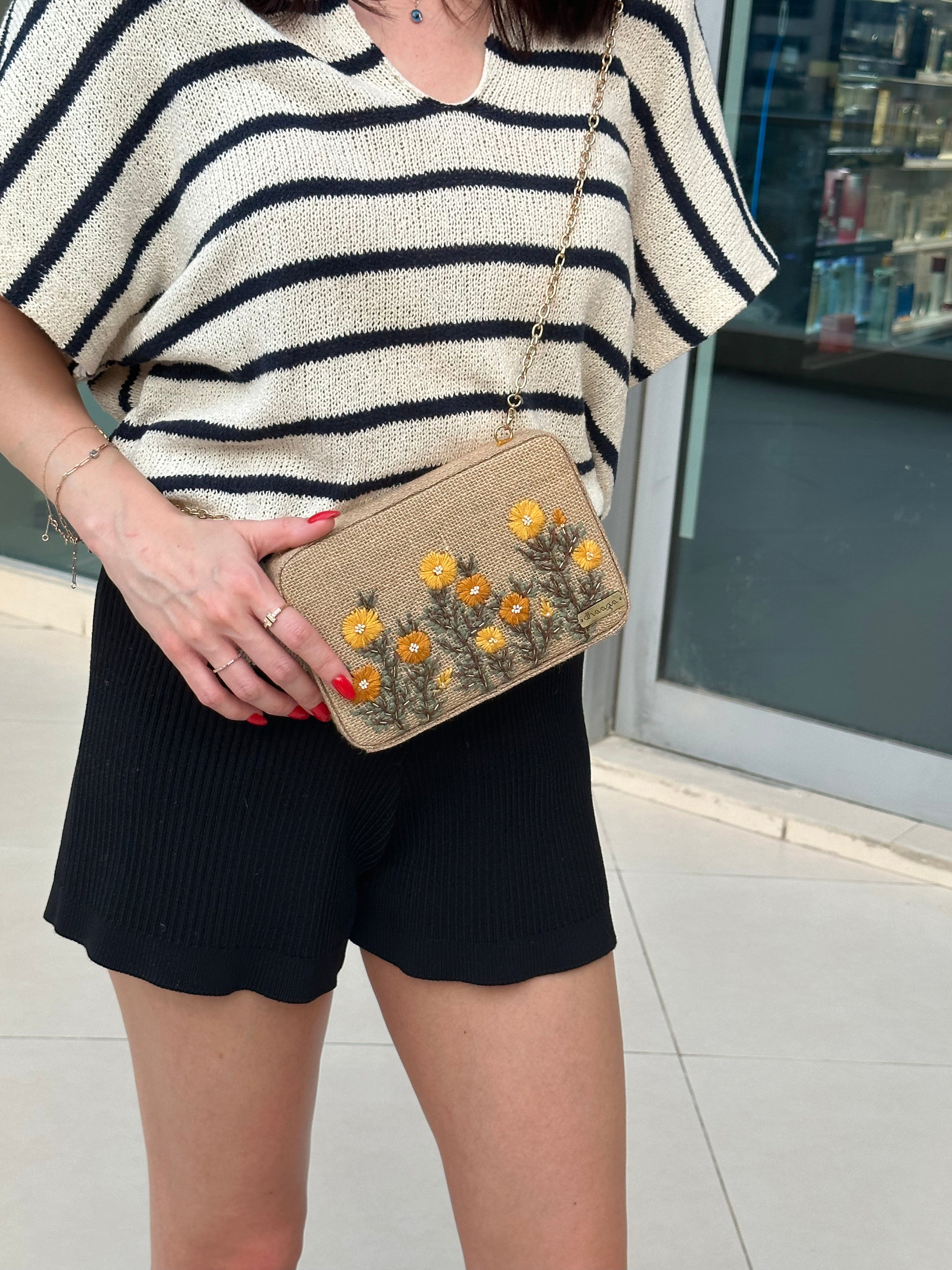 Statement-making hand-embroidered box clutch, perfect for brunch, festivities, and family gatherings.