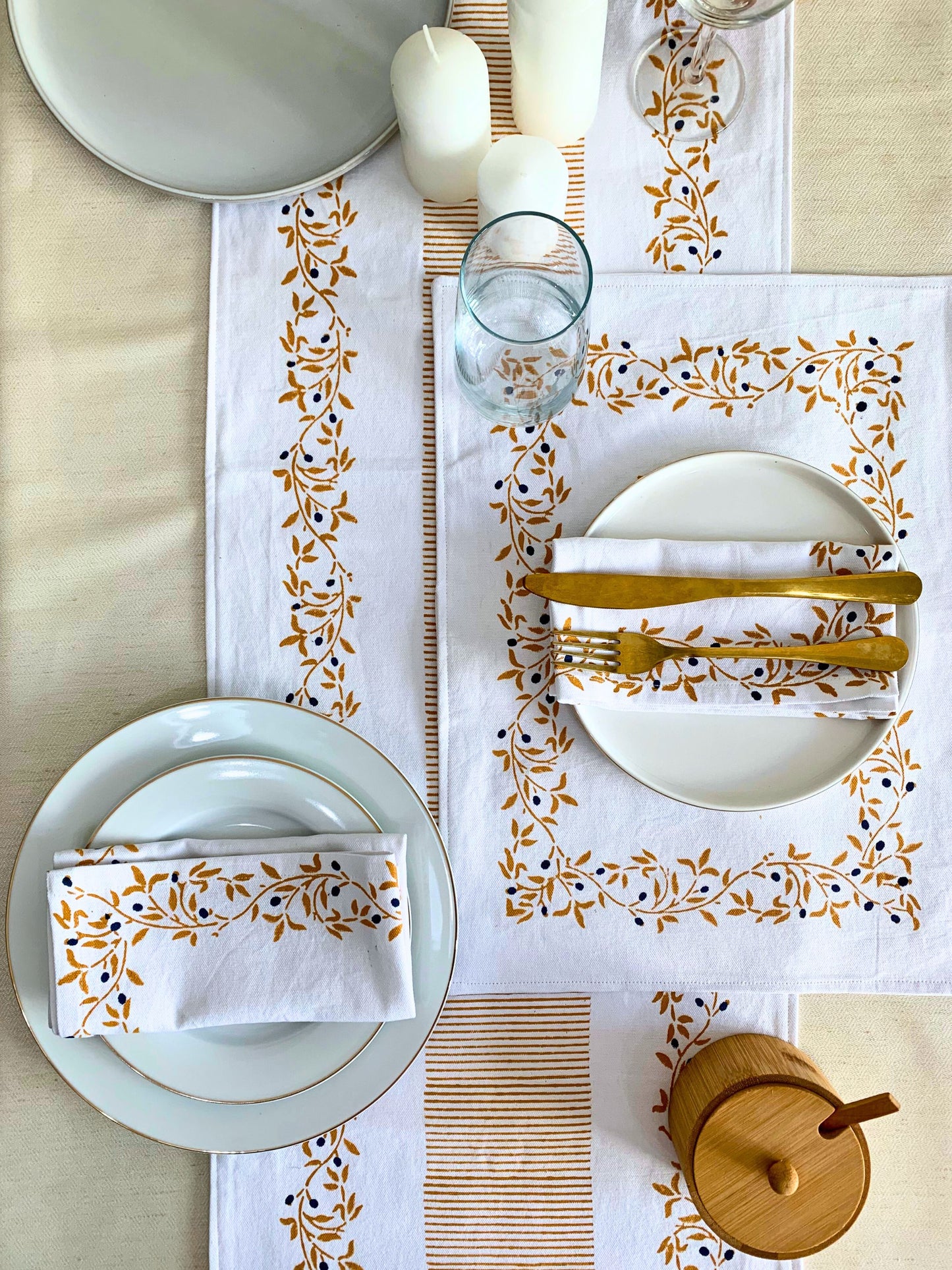 GOTS certified organic cotton table runner, meticulously crafted with a block-printed floral pattern and clean lines, adding both quality and sustainability to your dining space.