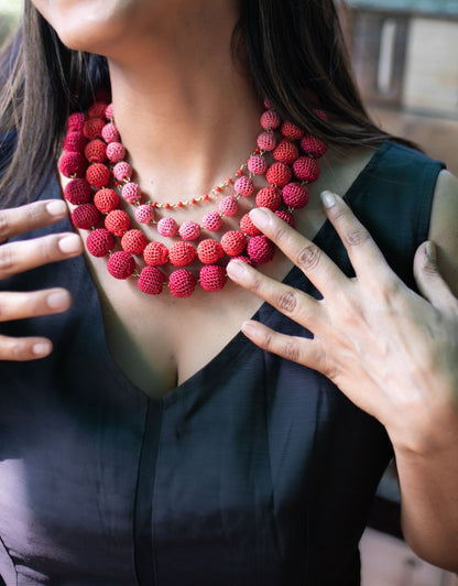 Handcrafted Red ombre four-layered crochet bead necklace for a stunning wardrobe upgrade.