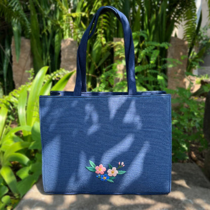 This unique tote, adorned with soft Vegan suede and premium threads, combines eco-friendly materials with exquisite craftsmanship.