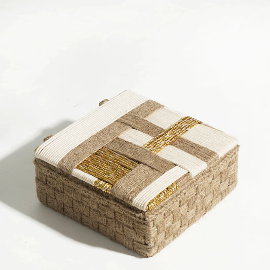 handwoven box, displaying classic accents and made from upcycled plastic, jute, and cotton ropes 