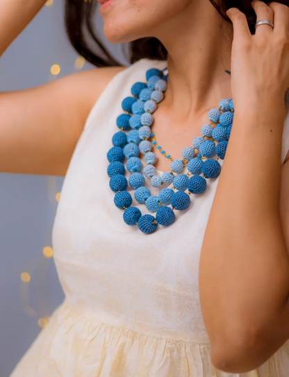 A dynamic touch of color: handmade ombre crochet necklace in blue for casual or special occasions.