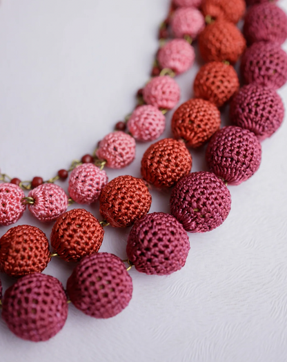 Handcrafted Red ombre four-layered crochet bead necklace for a stunning wardrobe upgrade.