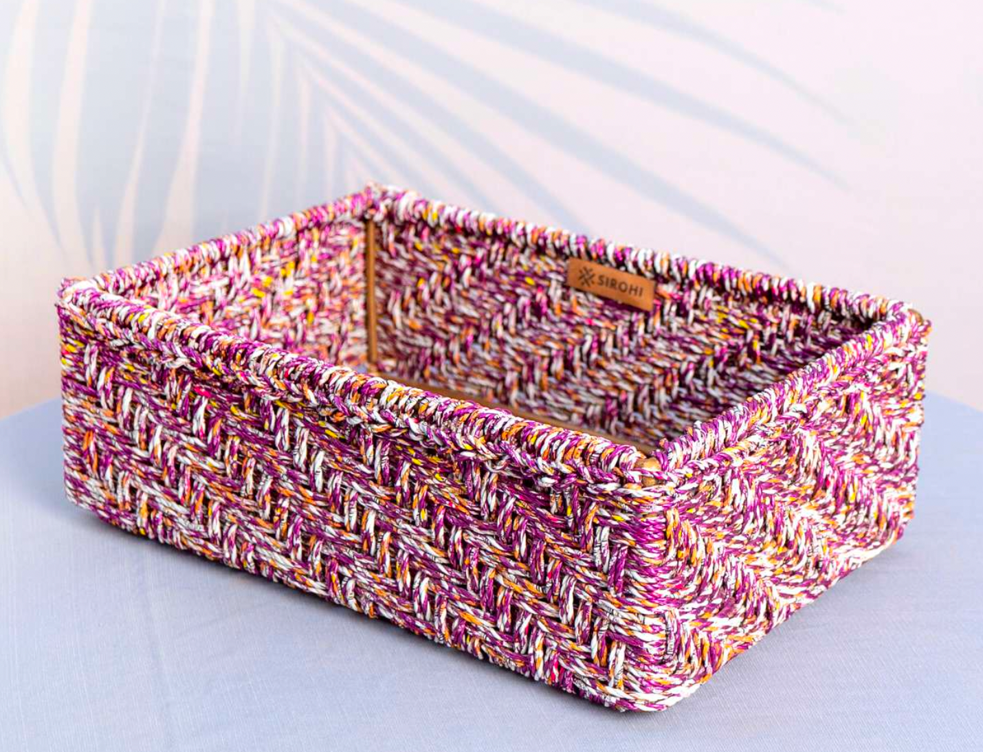 Sustainable, handwoven tray for home decor in beige and gold