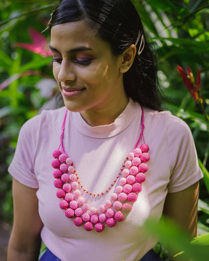 Effortlessly stylish four-layered pink crochet necklace, ideal for special events.