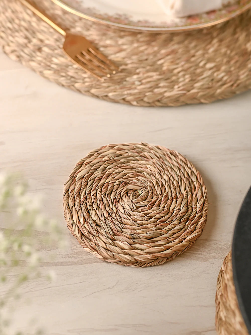 Enhance your home decor with handmade Sabai Grass Coasters, meticulously crafted for durability.