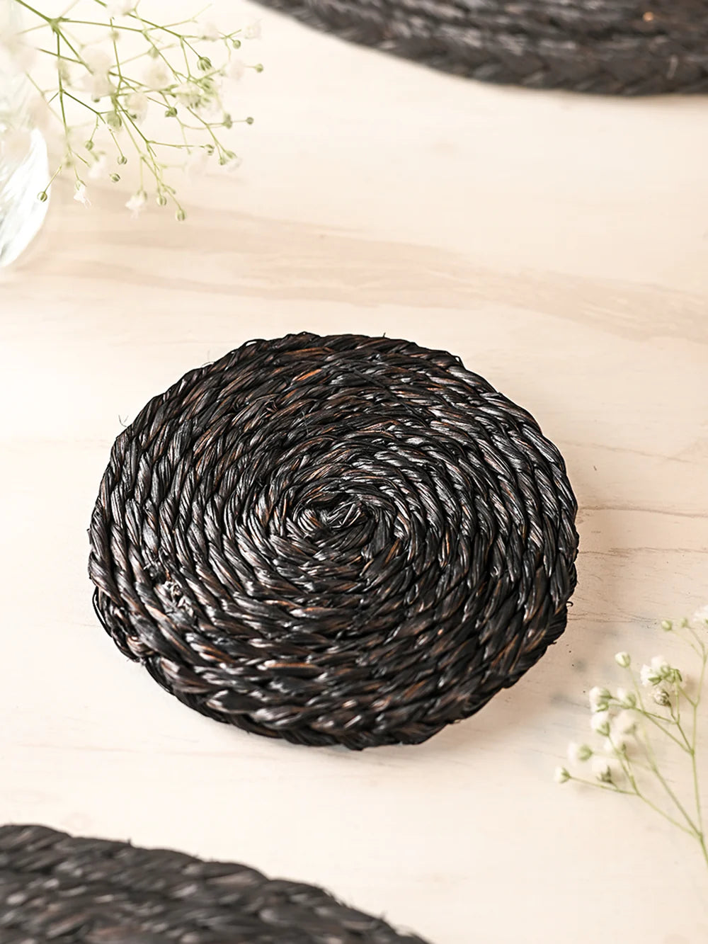 Elevate your living space with our durable handmade Sabai Grass Coasters, a stylish addition to your home decor.