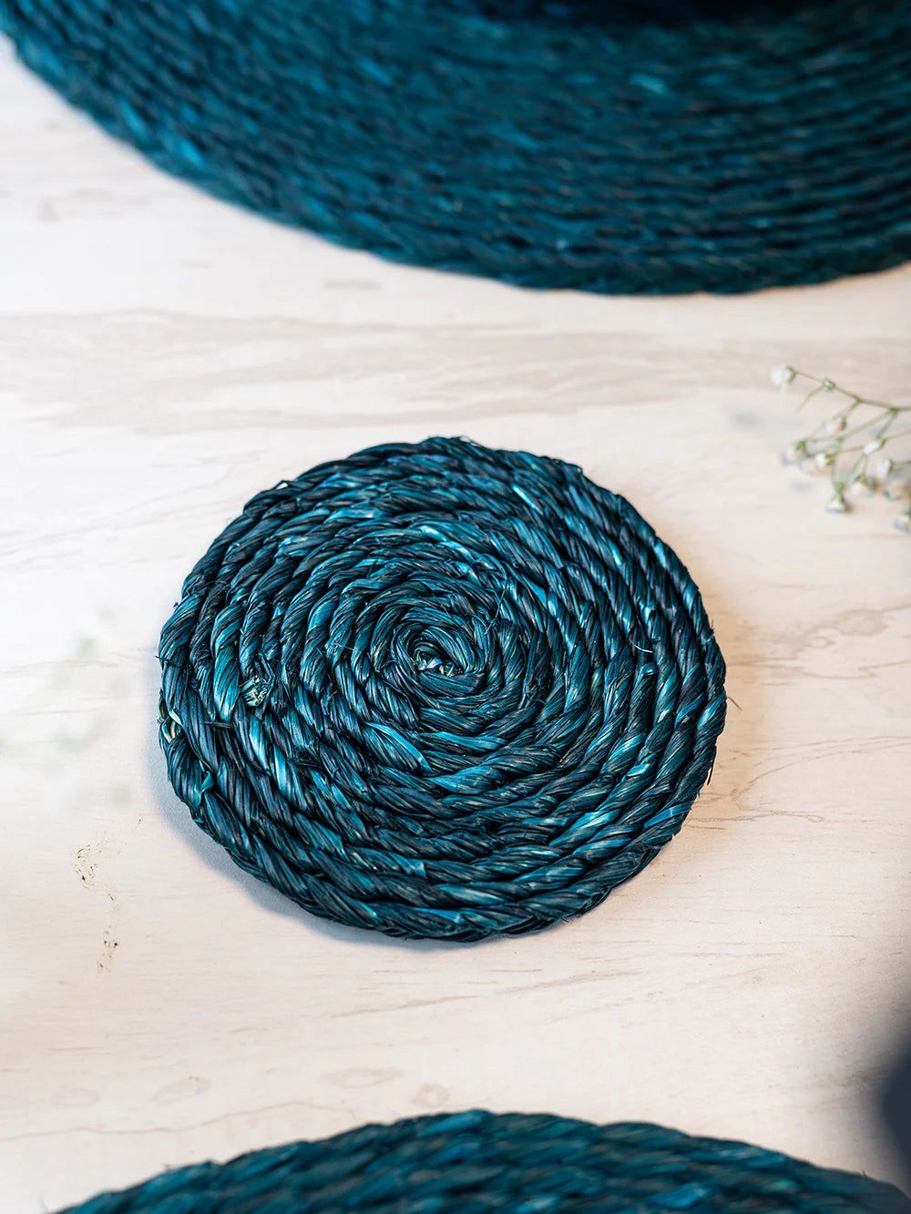 Upgrade your tabletop aesthetics with handmade Sabai Grass Coasters, thoughtfully crafted for lasting durability