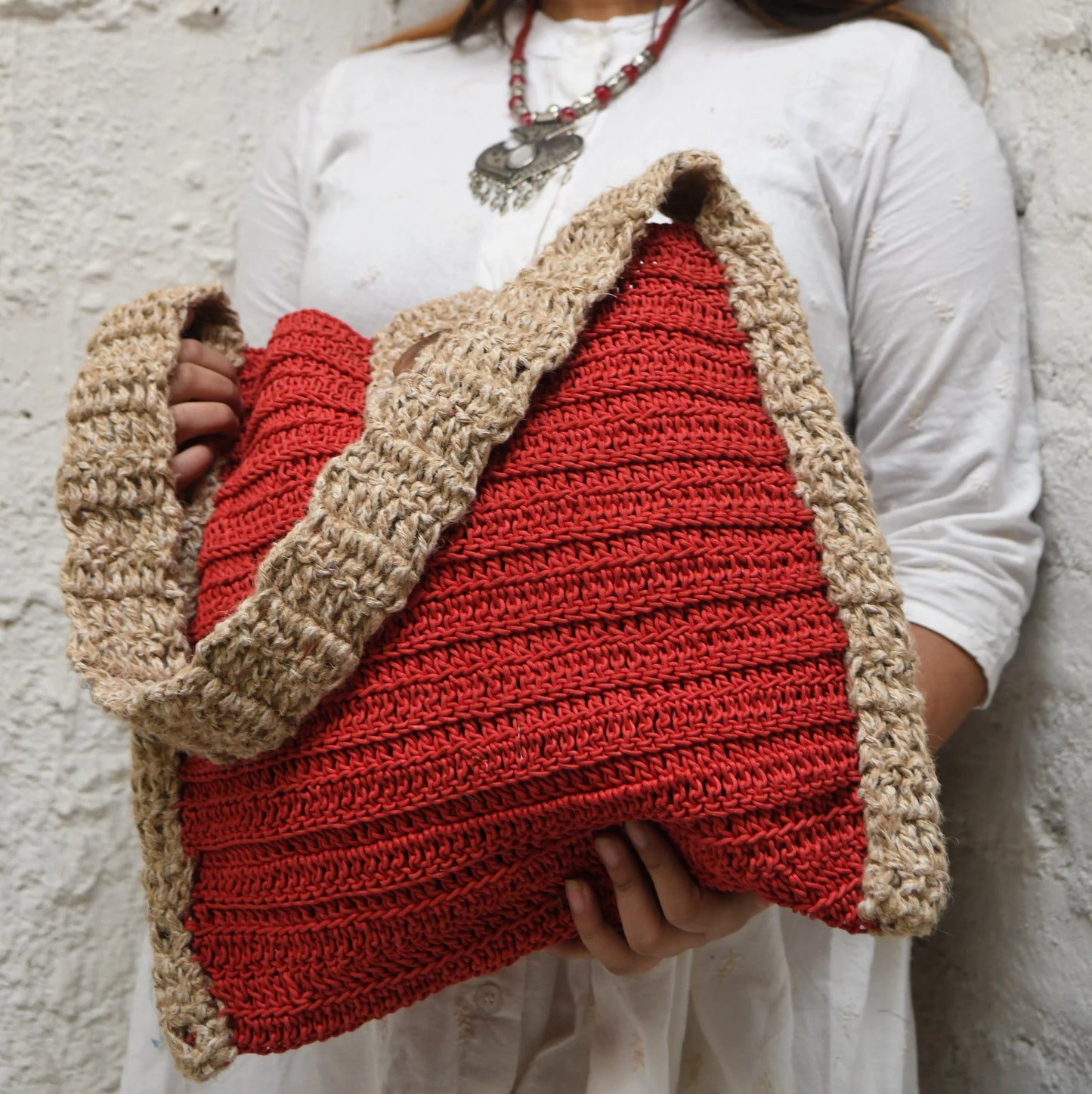 Red hobo bag, thoughtfully crocheted from high-quality acrylic yarn