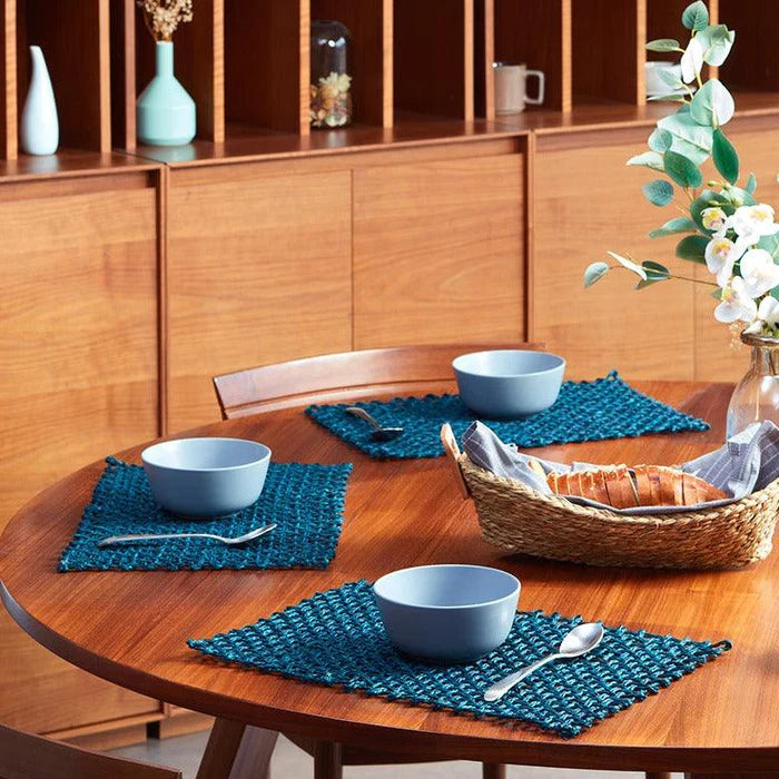 Elevate your dining table aesthetics with our Set of 6 Rectangle Table Mats made from handloomed Sabai Grass.