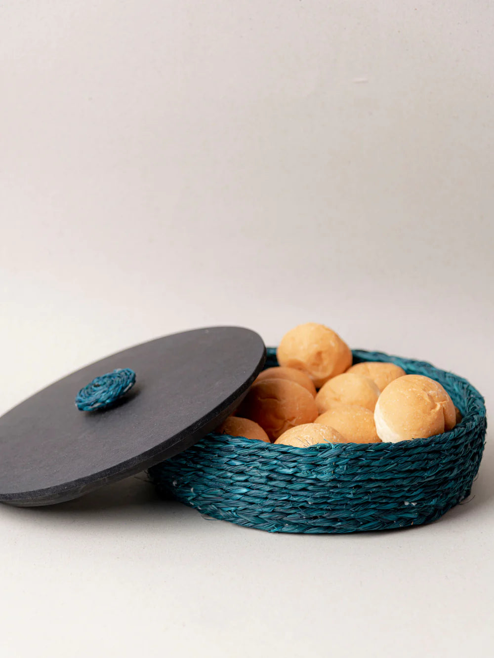 Handwoven sabai grass roti box, a versatile addition for home and event use.