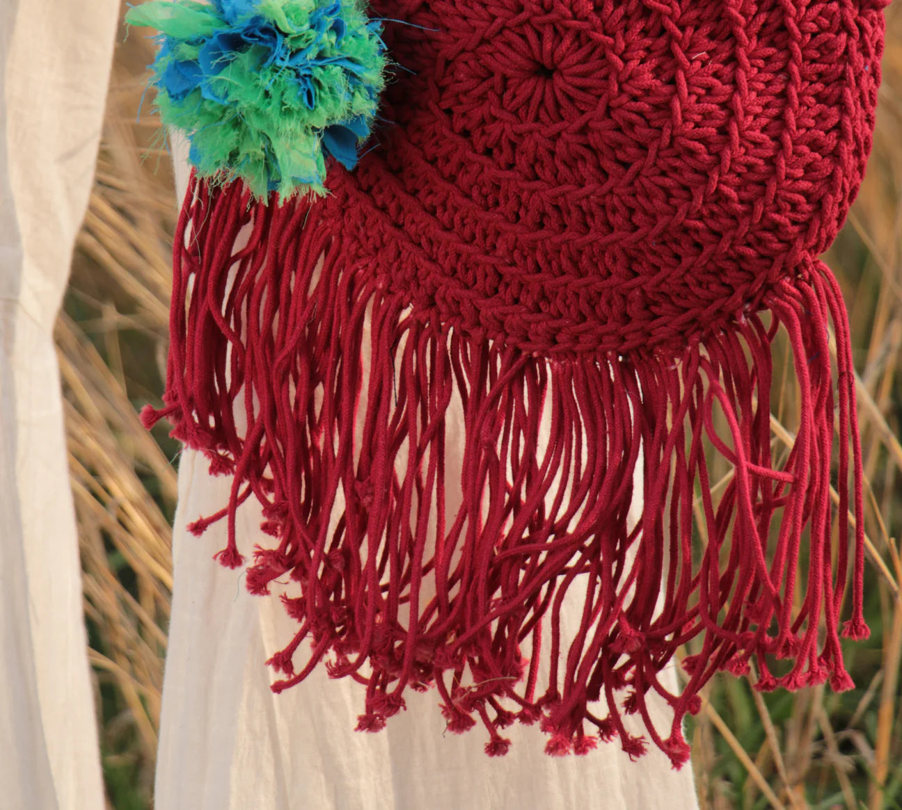 hand-crocheted to perfection with 100% cotton yarn and adorned with recycled textile waste bobbles.