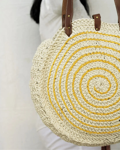 Discover the art of handmade elegance with this versatile cotton yarn tote bag.