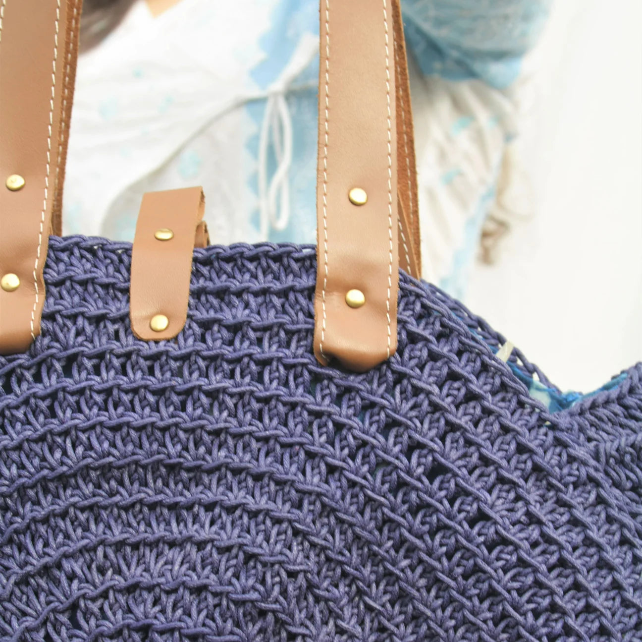 Indulge in the art of craftsmanship with this meticulously hand-crocheted everyday tote, created from high-quality cotton yarn to ensure durability and a subtle touch of handmade sophistication.