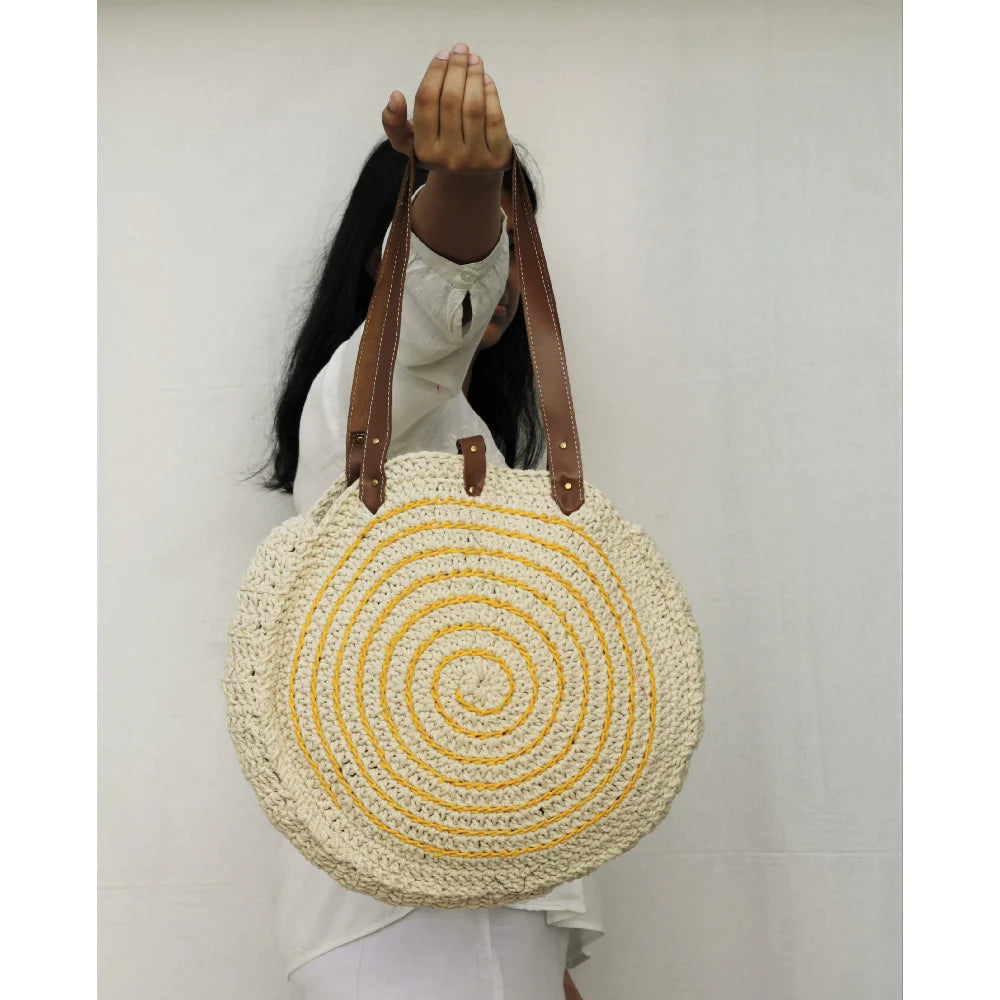 Hand-crocheted cotton yarn tote bag, combining style and durability for everyday use.